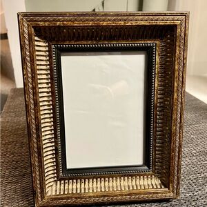 Sturdy ornate frame for 5x7” art.